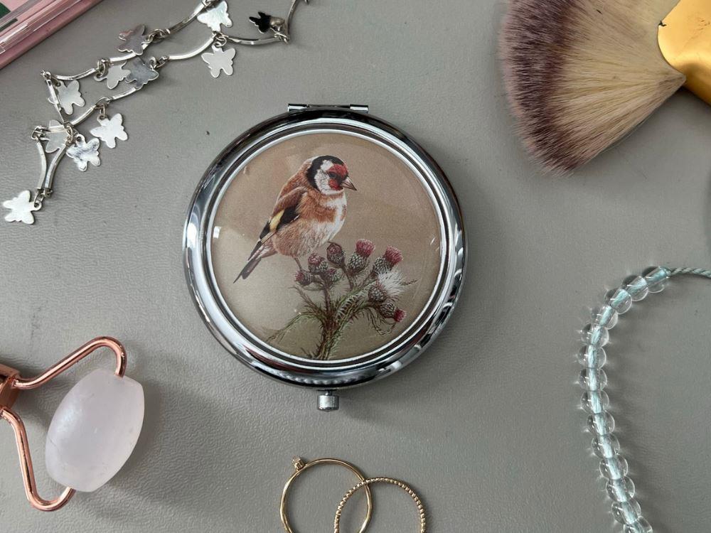 compact-mirror-goldfinch